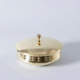 brass hammered handi with lid.