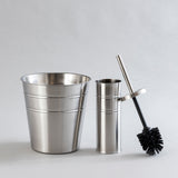 Shiny stainless steel waste bin and brush holder combo.