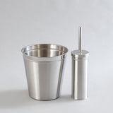 Shiny stainless steel waste bin and brush holder combo.