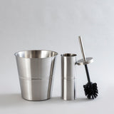 Shiny stainless steel waste bin and brush holder combo.