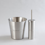 Shiny stainless steel waste bin and brush holder combo.