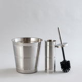 Shiny stainless steel waste bin and brush holder combo.